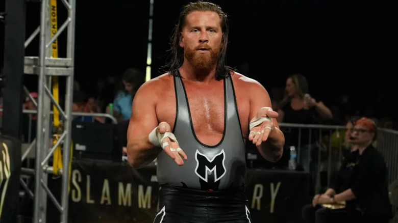 Brian Myers wearing a singlet