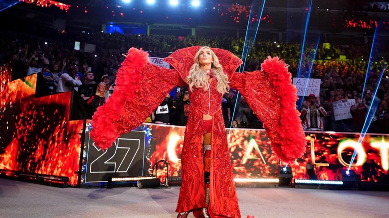 Charlotte Flair poses on the stage during her return at the 2025 Royal Rumble.