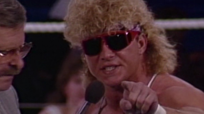 Brian Pillman sunglasses pointing