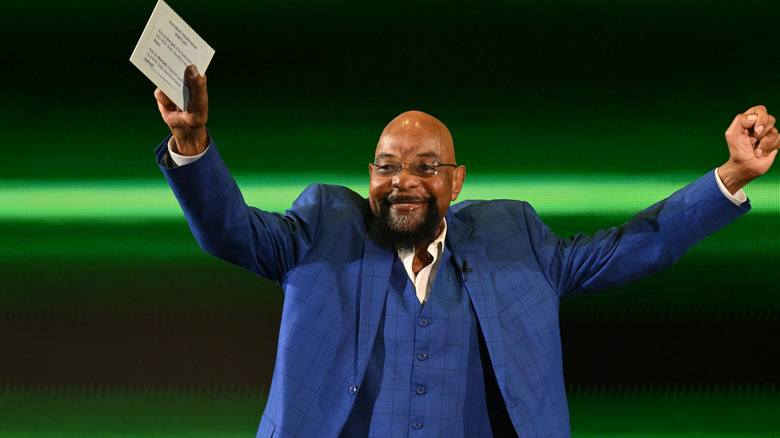 Teddy Long smiling