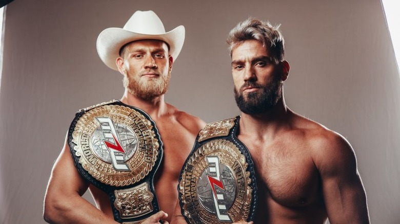 Marshall and Ross holding the tag titles