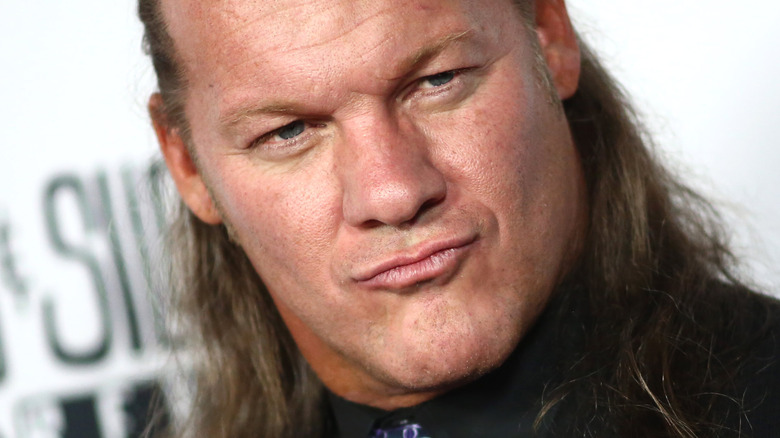 Chris Jericho titls head