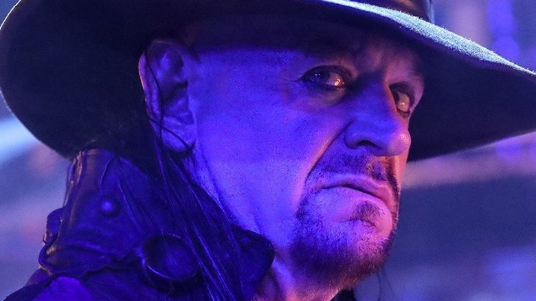 The Undertaker looks away