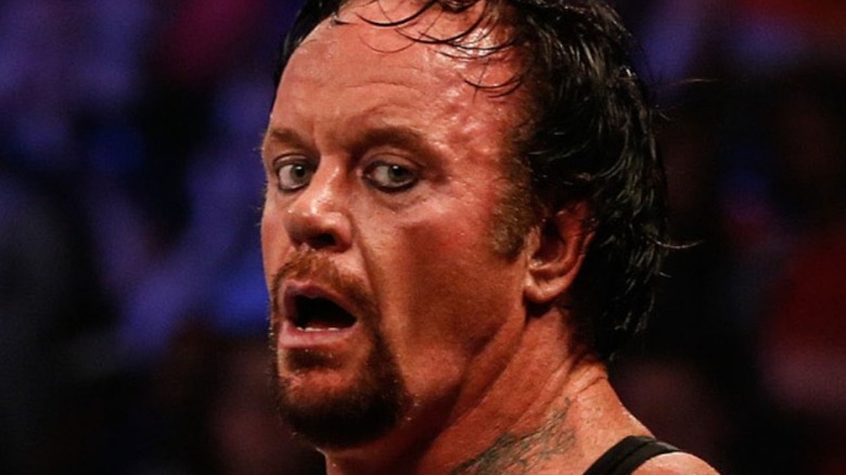 undertaker looking very sweaty