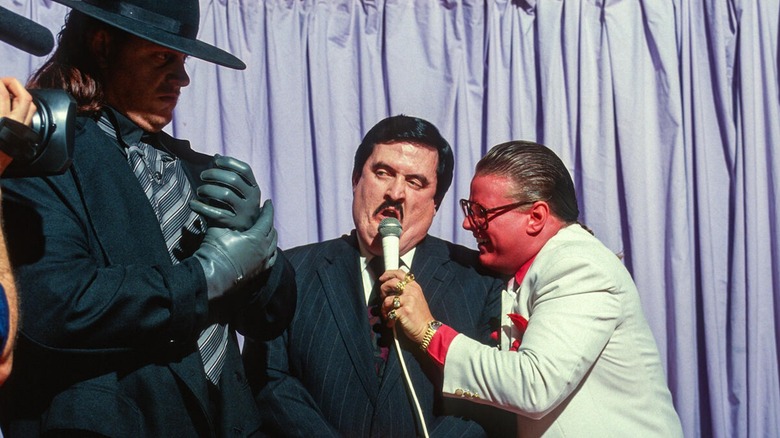 The Undertaker, Paul Bearer, and Brother Love during Bearer's WWE debut.