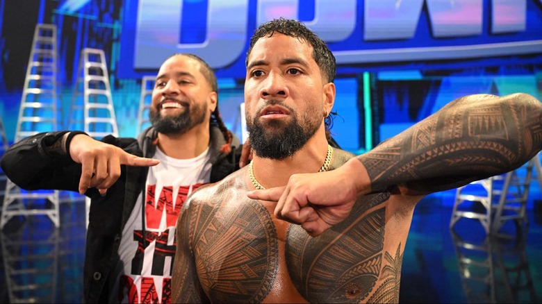 The Usos posing in front of ladders on "WWE SmackDown"