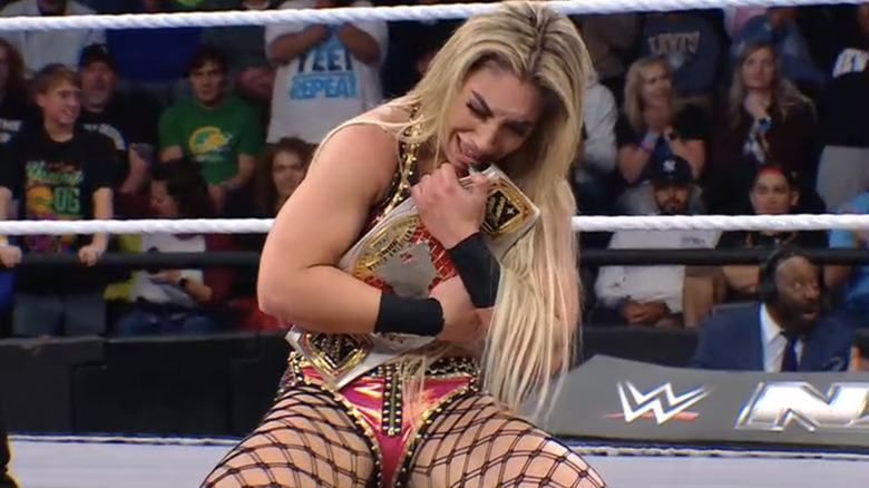 Thea Hail sobs as she holds the 