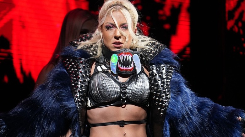 Thekla glares straight at the camera as she makes her entrance.