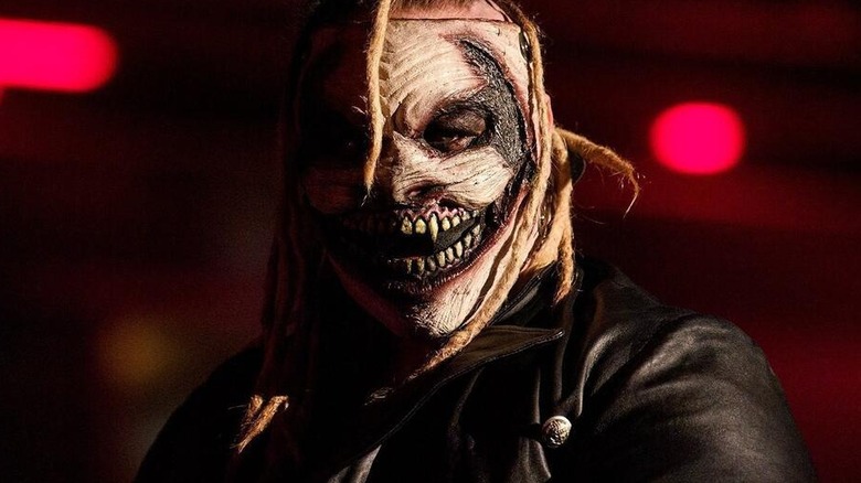 The Fiend (Bray Wyatt) poses and looks at the camera in the ring before a match on WWE television.