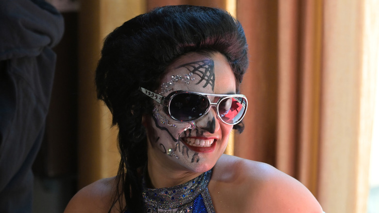 Thunder Rosa trying out her best Elvis impression