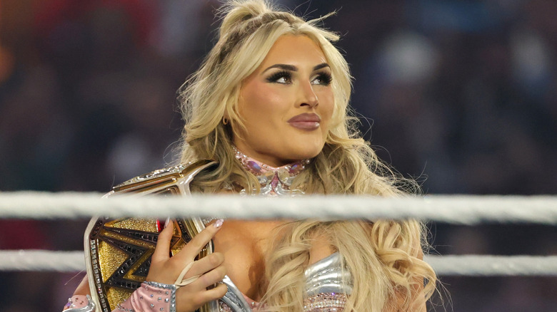 Tiffany Stratton holding the WWE Women's Championship