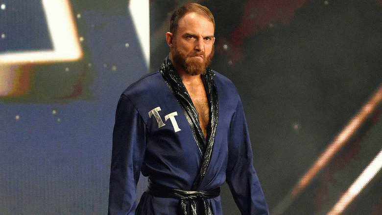 Timothy Thatcher wearing a blue robe