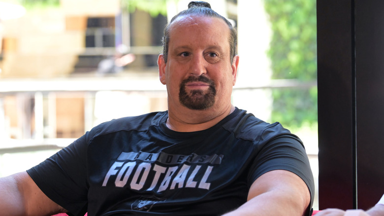 Tommy Dreamer is wearing a black t-shirt