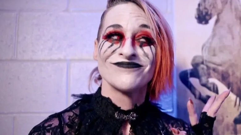 Rosemary smiles as her work on summoning Allie from the dead is working