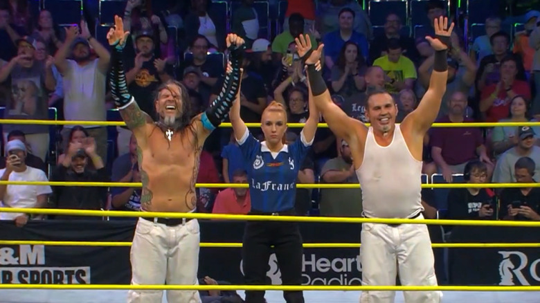 Matt and Jeff Hardy celebrate victory
