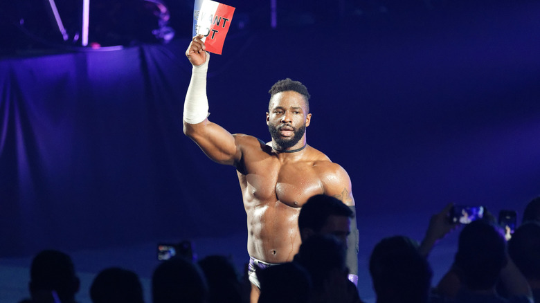Cedric Alexander raising his arm