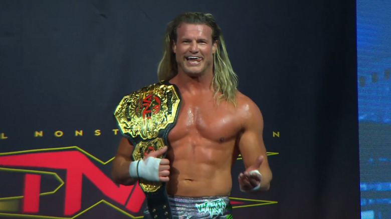 Nic Nemeth celebrates with the TNA World Championship on the ramp