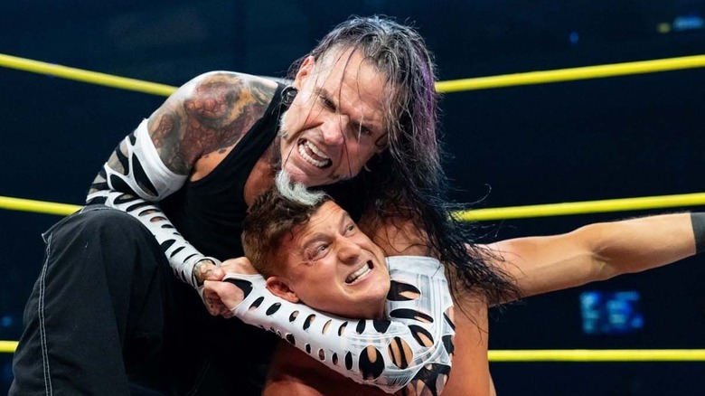Jeff Hardy putting Ryan Nemeth in a headlock