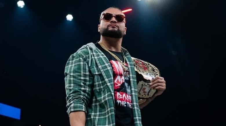 Mike Santana wearing sunglasses in the ring