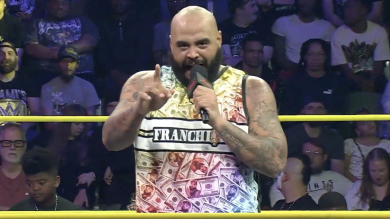 AJ Francis talking in the ring