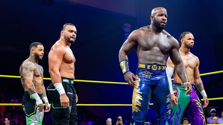 Mike Santana, Moose, Trey Miguel, and Leon Slater in a TNA ring