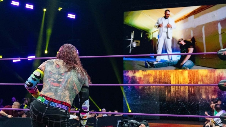Jeff Hardy watches on as Vincent tortures Matt Hardy backstage
