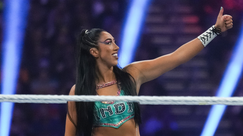 Indi Hartwell wearing green ring gear