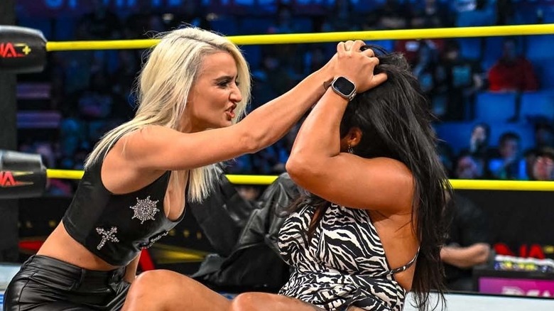 Xia Brookside grabs ahold of Léi Yǐng Lee moments after making up to her (pretend)