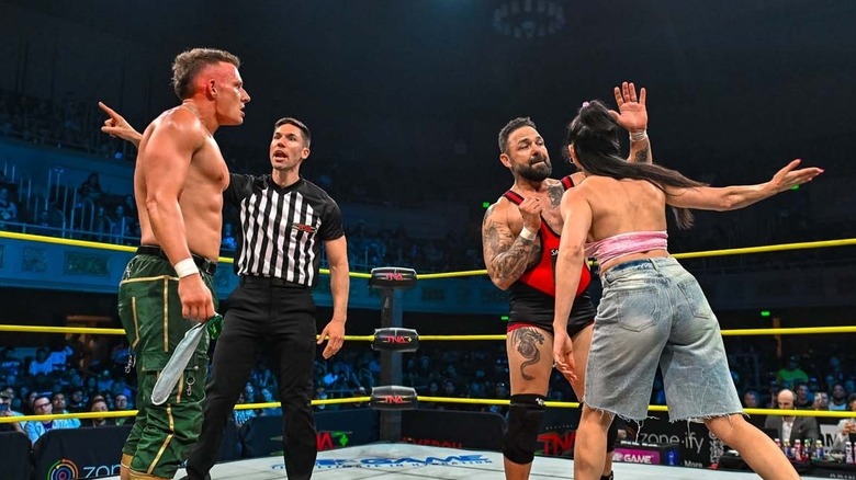 Arianna Grace tries to land a slap on her father Santino Marella