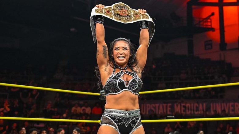 Lei Ying Lee celebrating her TNA Knockouts Championship win