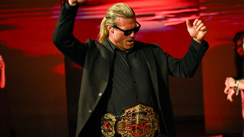 Nic Nemeth dancing with world title around waist
