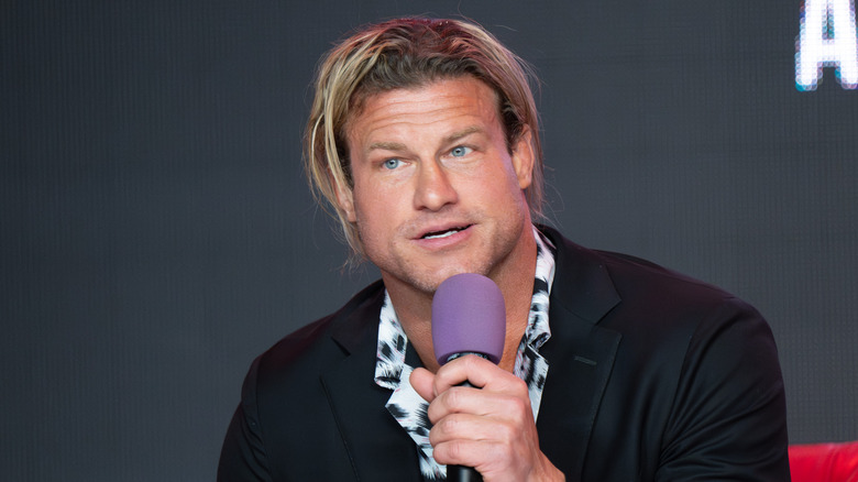 Nic Nemeth holding a microphone