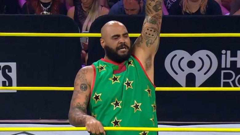 AJ Francis raising his arm