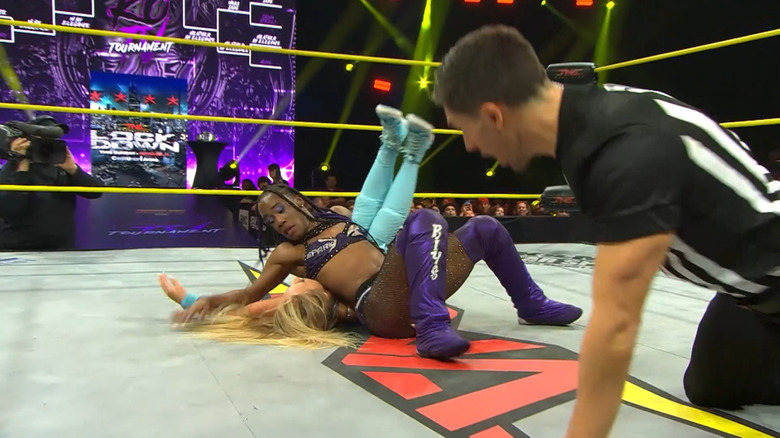 Jada Stone pins Heather By Elegance