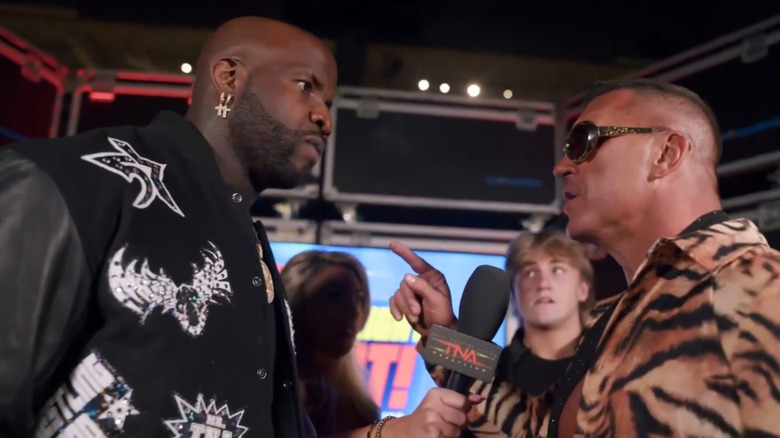 Moose and Frankie Kazarian face off with Avery Styles in the background