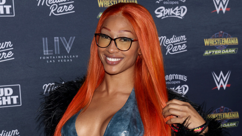 Mara Sade wearing glasses