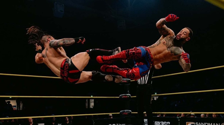 Jason Hotch and Trey Miguel in mid-air on TNA Impact
