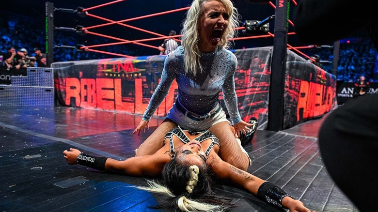 Xia Brookside sitting on Lei Ying Lee and screaming