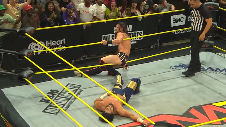 Jason Hotch and Mustafa Ali wrestling on TNA Impact