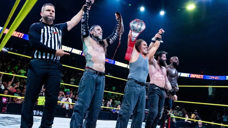 Hardys, Elijah and Moose celebrate their win