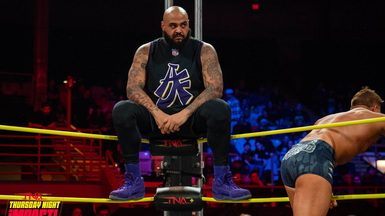 AJ Francis sitting on the turnbuckle