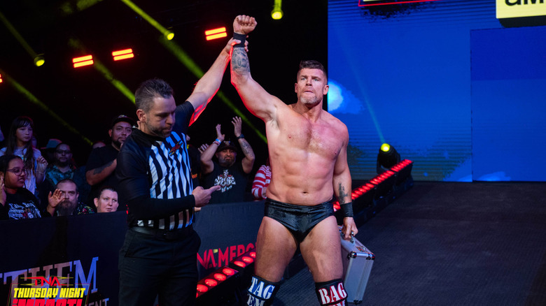 Steve Maclin with a briefcase