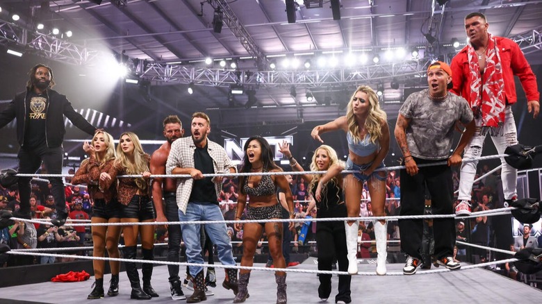 The TNA roster interrupts a broadcast of 
