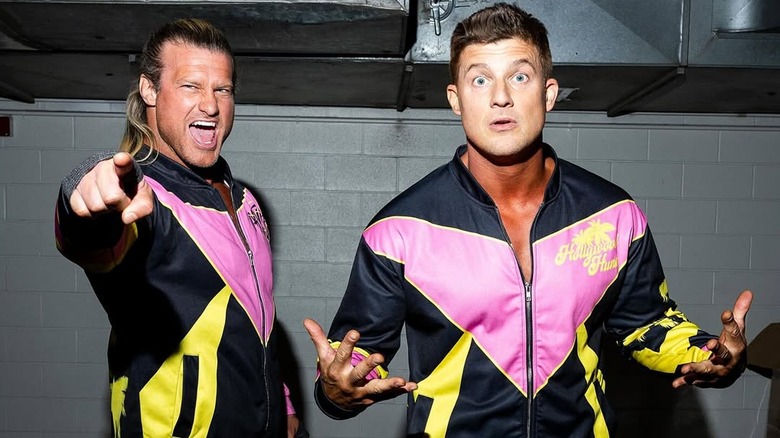Nic and Ryan Nemeth posing backstage during a TNA pay-per-view.