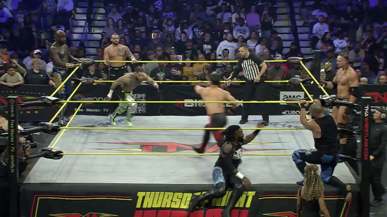 All eight men in the ring