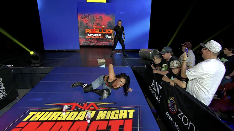 Threat standing above Blanchard on the entrance ramp