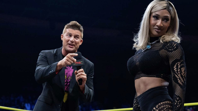 Nemeth and Sadé talking with one another in the ring