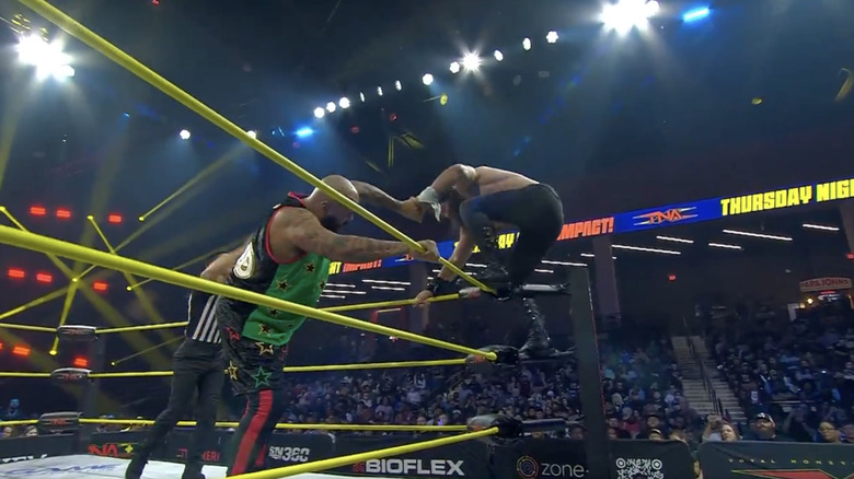 Francis and Elijah in the corner of the ring