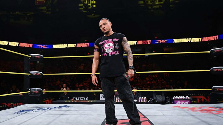 Navarro standing inside the ring