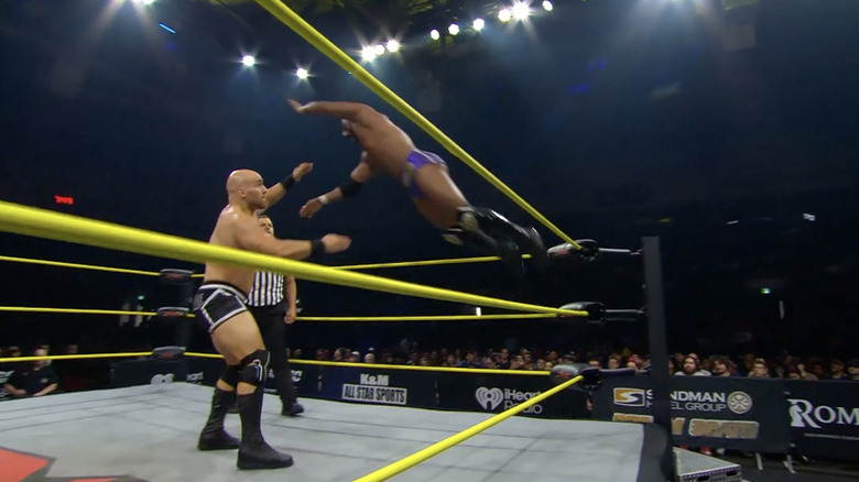 Raju about to fly off the ropes to level Aichner